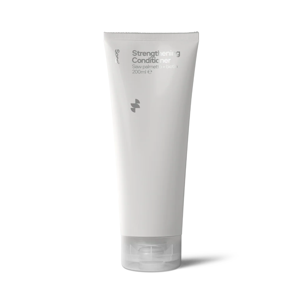 White tube of Strengthening Conditioner on a white background