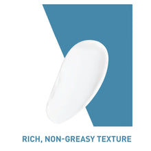 Image of a smear of cream over a blue and white background to demonstrate cream texture.