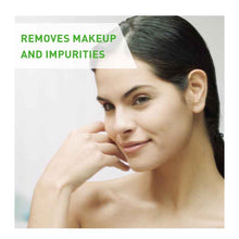 Image of dark haired lady with cleansed face