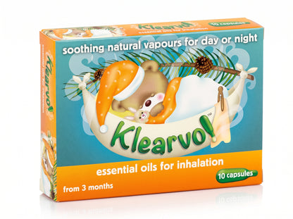A box of Klearvol essential oils for inhalation, featuring a cartoon brown bear sleeping in a hammock with pine needles and an orange night cap hat on a teal, orange, and white background.