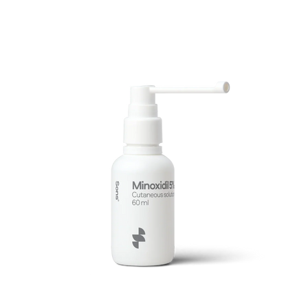 White bottle of Minoxidil 5% on a white background