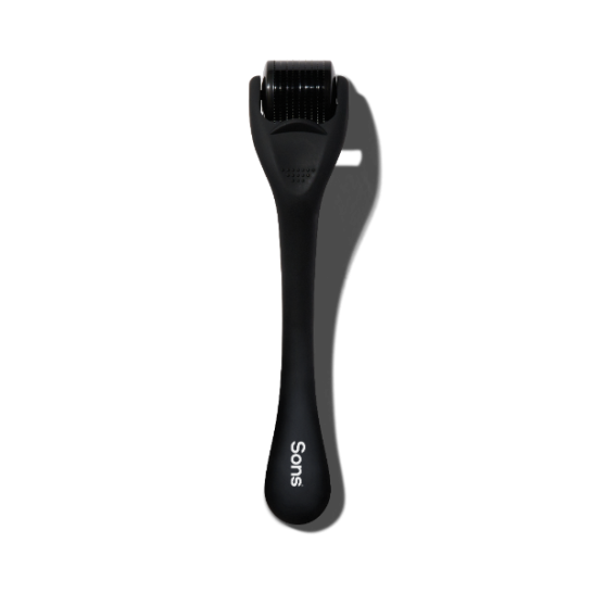 Black skin care tool with 'Sons' branding on a white background