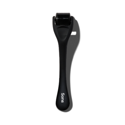 Black skin care tool with 'Sons' branding on a white background