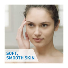 Image of dark haired person applying moisturiser for soft smooth skin