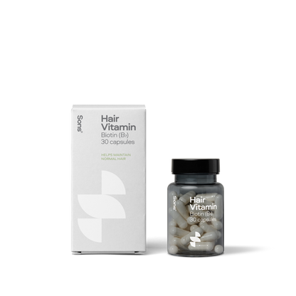 Image of Sons Biotin Caps in grey box with dark grey translucent bottle of white capsules 