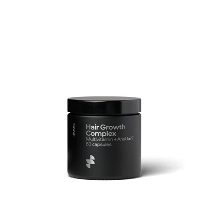 Black container of Hair Growth Complex on a white background