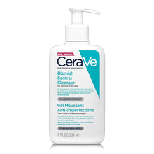 A pump bottle of CeraVe Blemish Control Cleanser with a white and blue label, indicating the product is formulated with ceramides, niacinamide, and salicylic acid.