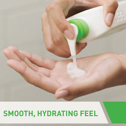 Image of green and white CeraVe Hydrating Cleanser Pump being dispensed into palm of hand for use.