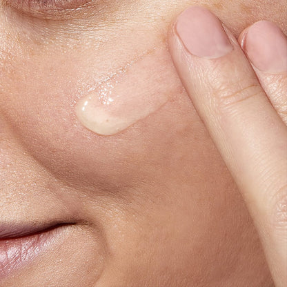 CeraVe Resurfacing Retinol Lightweight Serum being applied to cheek