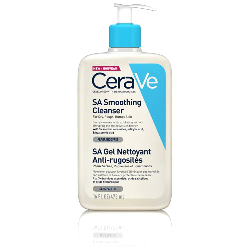 A pump bottle of CeraVe SA Smoothing Cleanser with blue and white label, indicating that it's enriched with ceramides and hyaluronic acid and is fragrance-free. Developed with dermatologists.