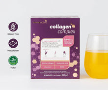 Collagen complex supplement box with a glass of orange juice on a white background